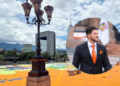 Estado-de-nuevo-leon - La Sultana Informa a City Plaza with a Colorful Mural on the Ground and Ornate Street Lamps, Plus a Circular Inset of a Man in a Dark Suit and Orange Tie. - La Sultana Informa